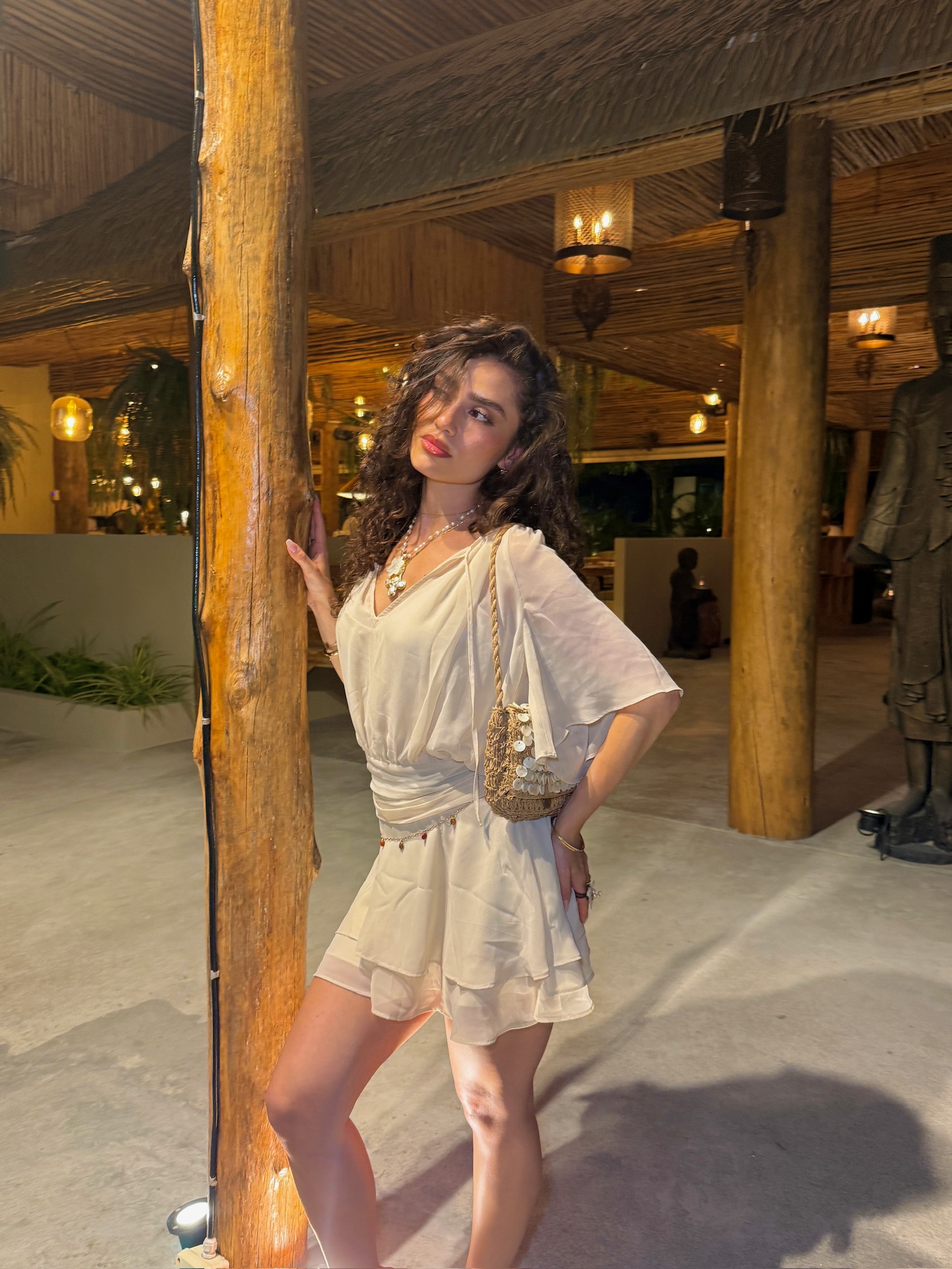 Nathaly wearing a neutral resort look